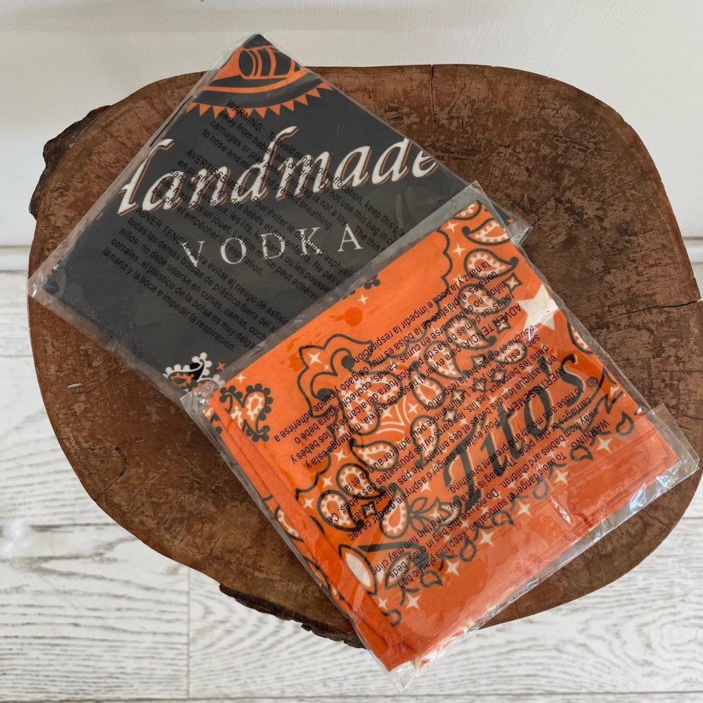 Two Tito’s vodka bandanas